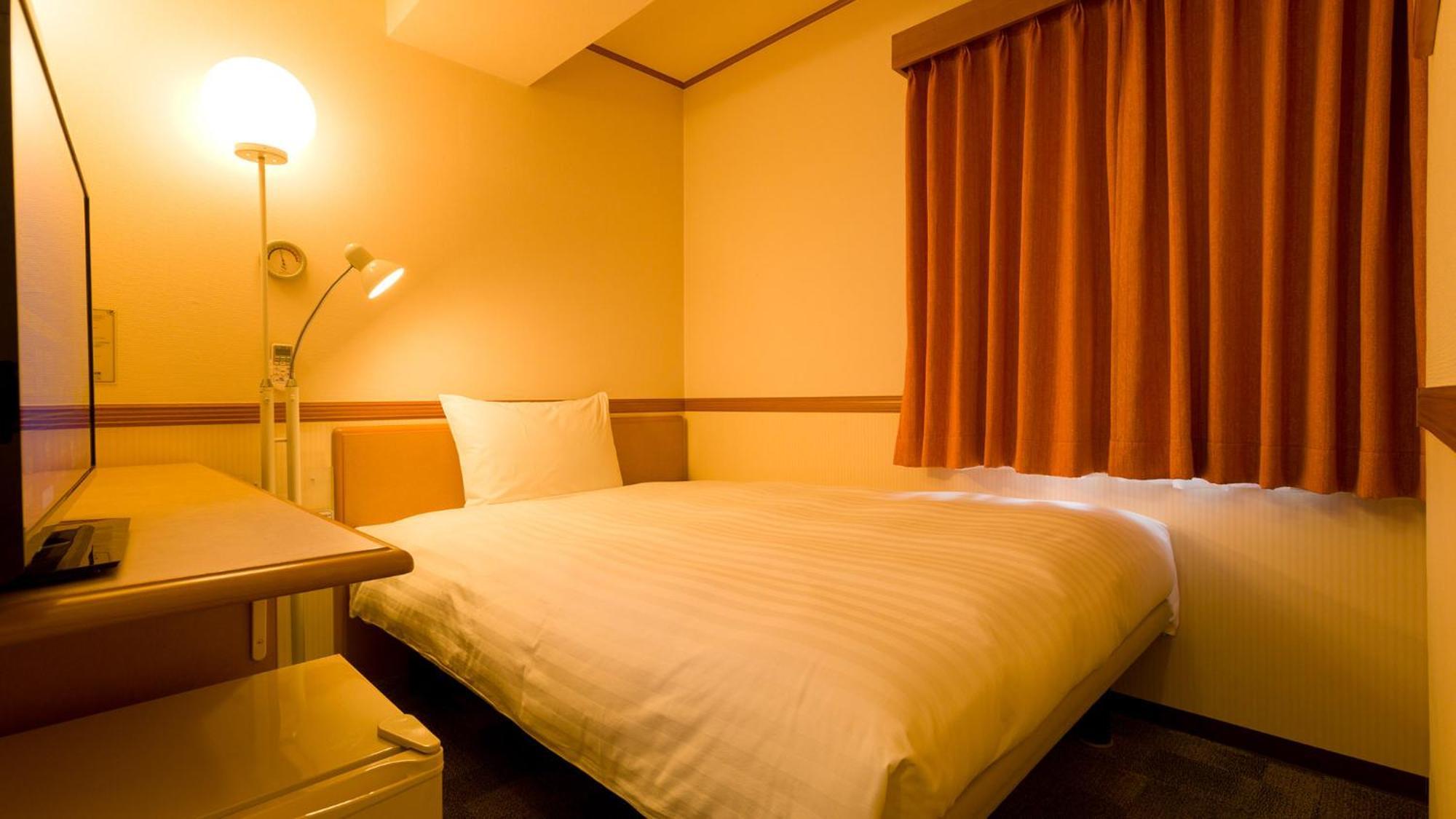 Toyoko Inn Kobe Sannomiya-Eki Higashi Pokoj fotografie
