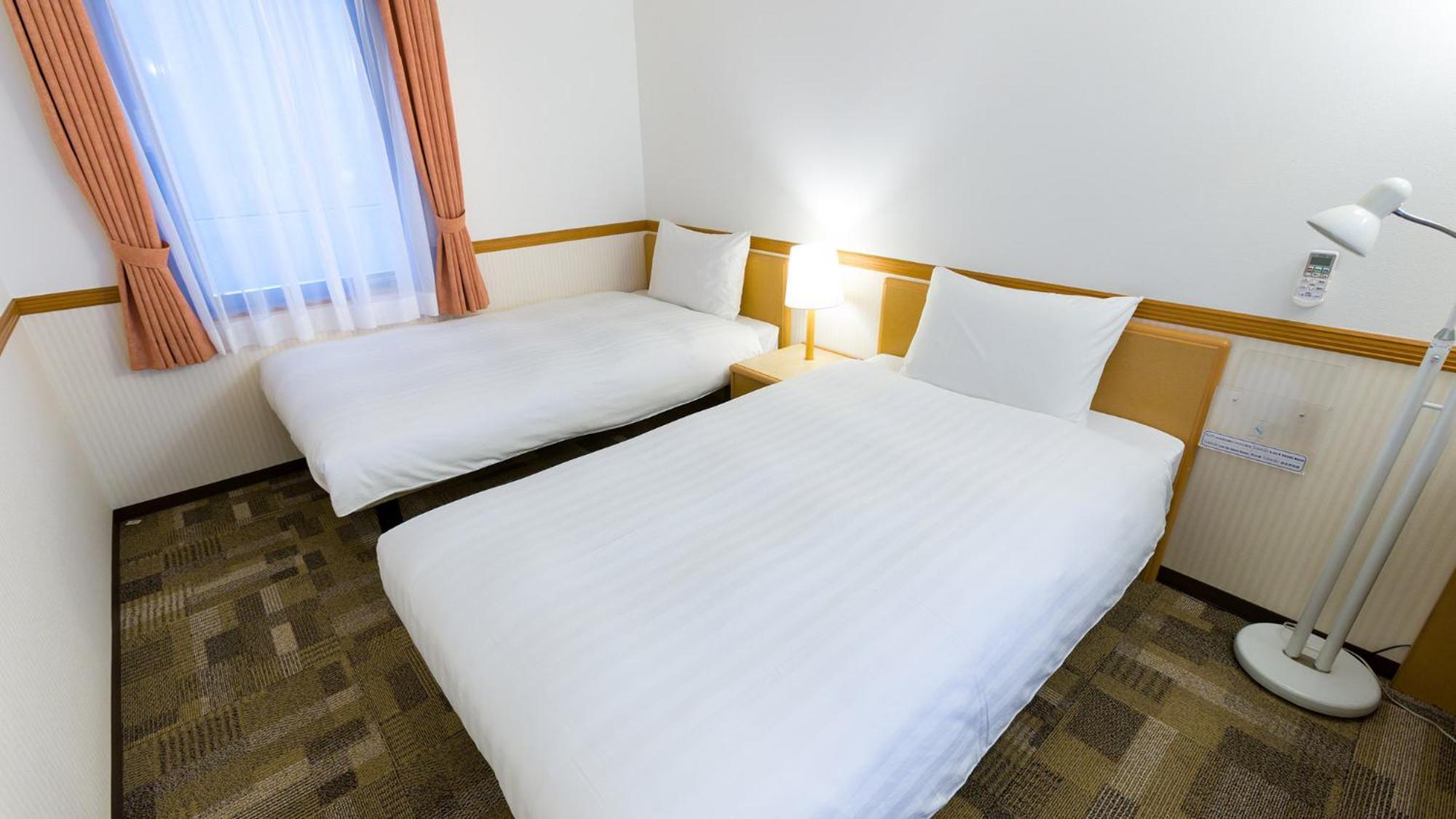Toyoko Inn Kobe Sannomiya-Eki Higashi Pokoj fotografie